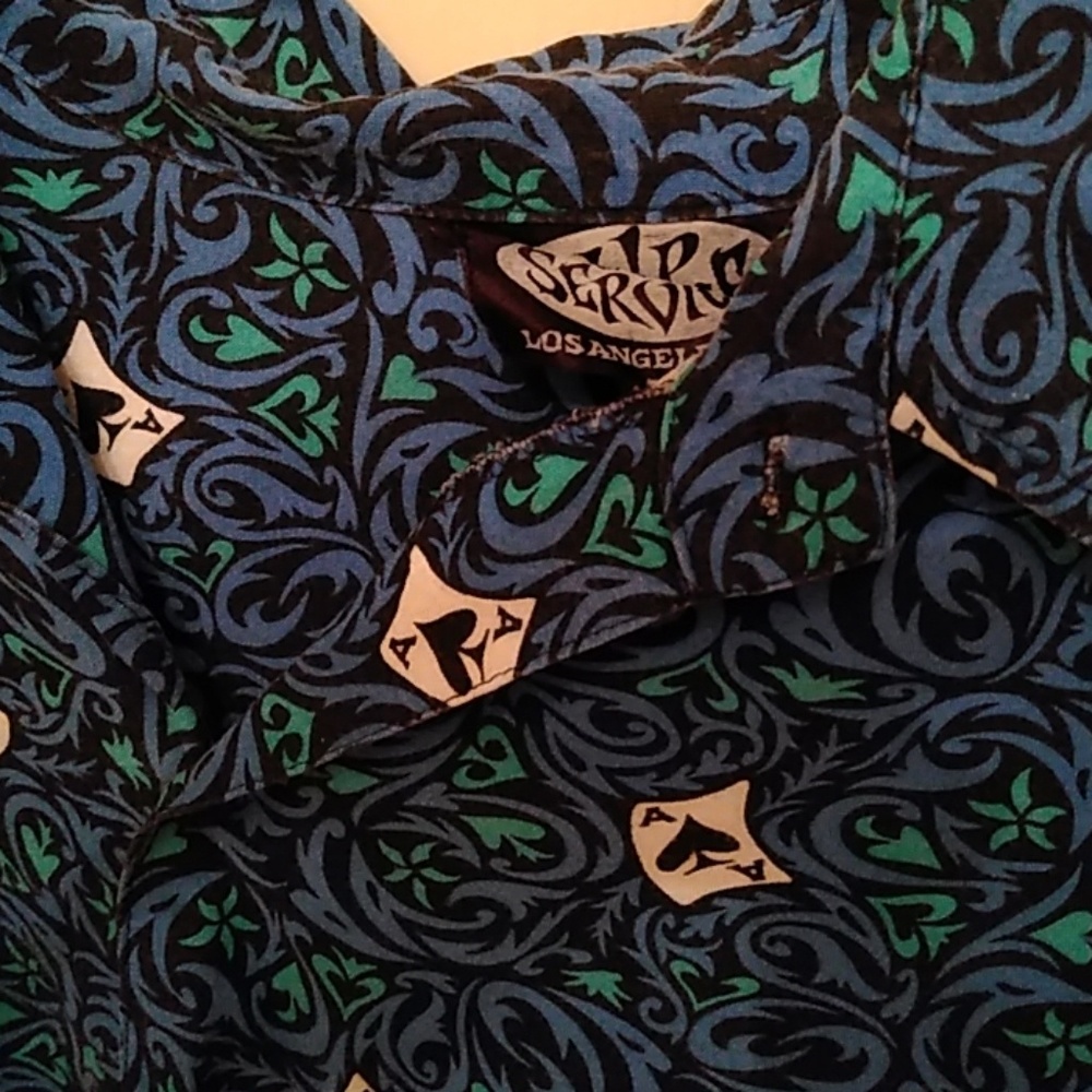 Lip service blue and white shirt.